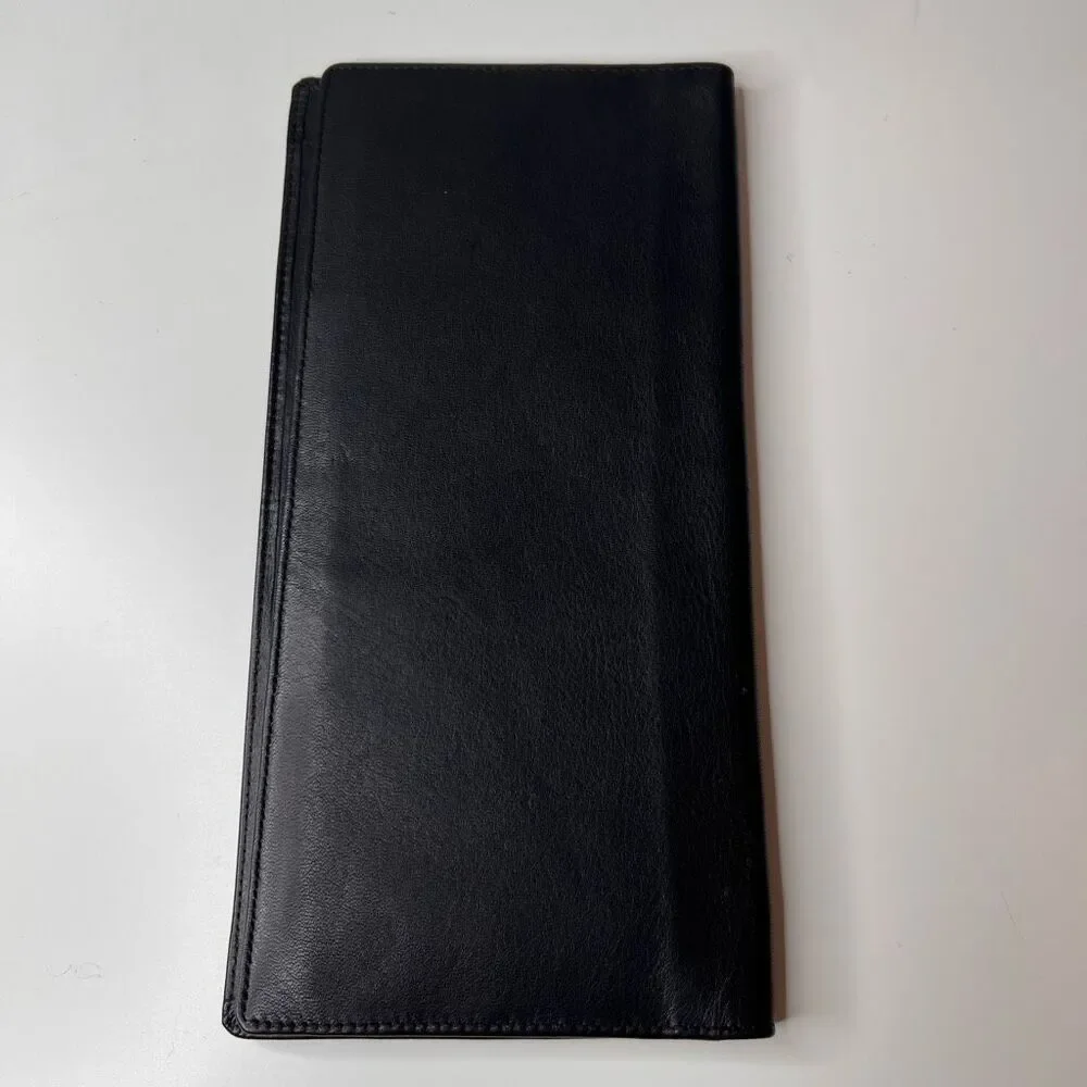Vintage leather passport and traveling documents holder
